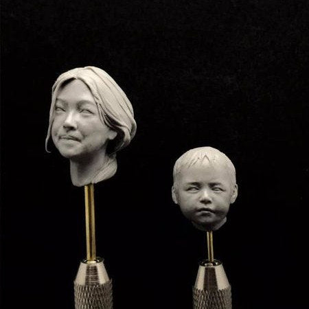 Motherhood mom and son in traditional Tibetan clothes resin model